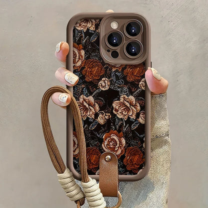 Funda iPhone Jardín Barroco con rosas vintage y correa de mano