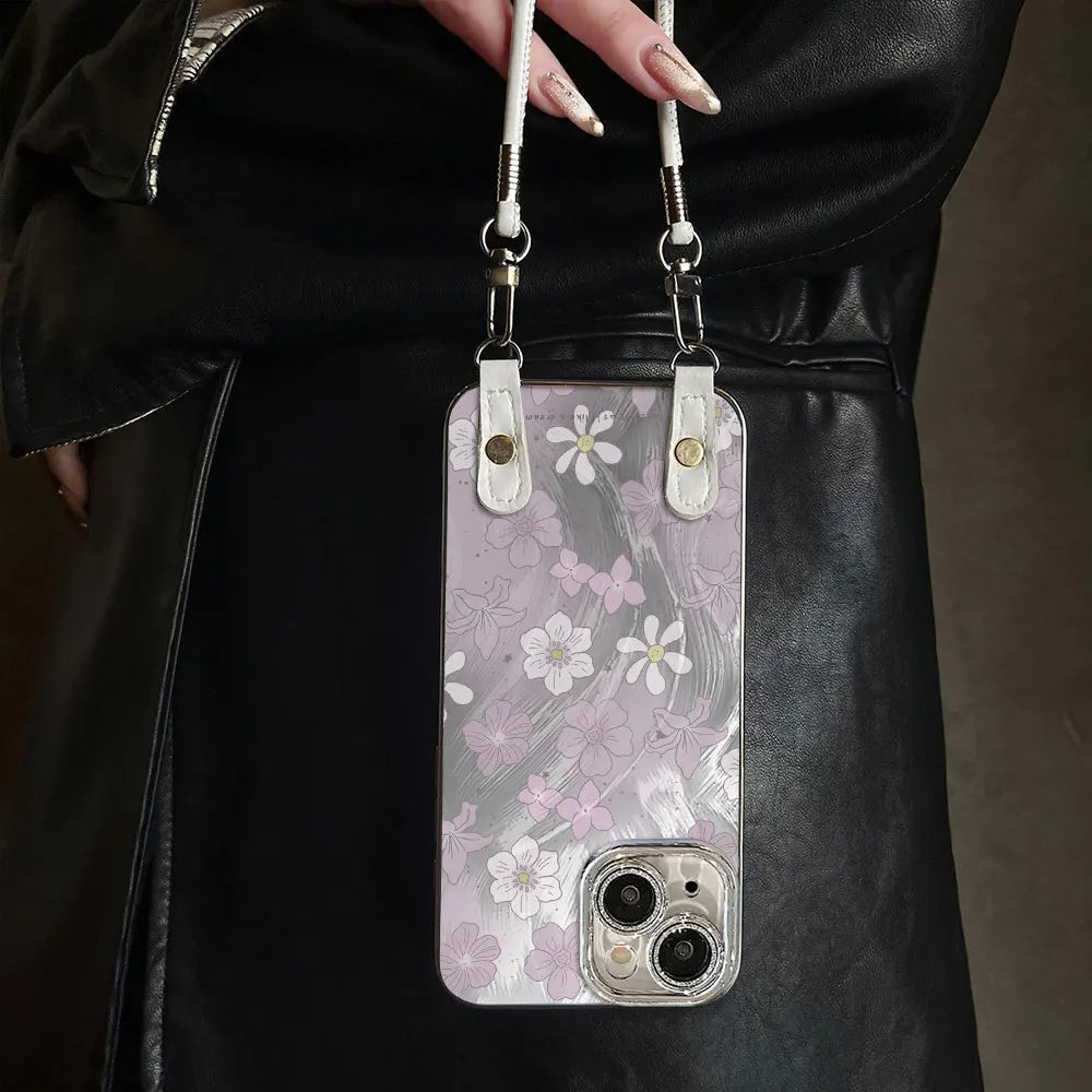 Funda floral lila para iPhone con correa de mano